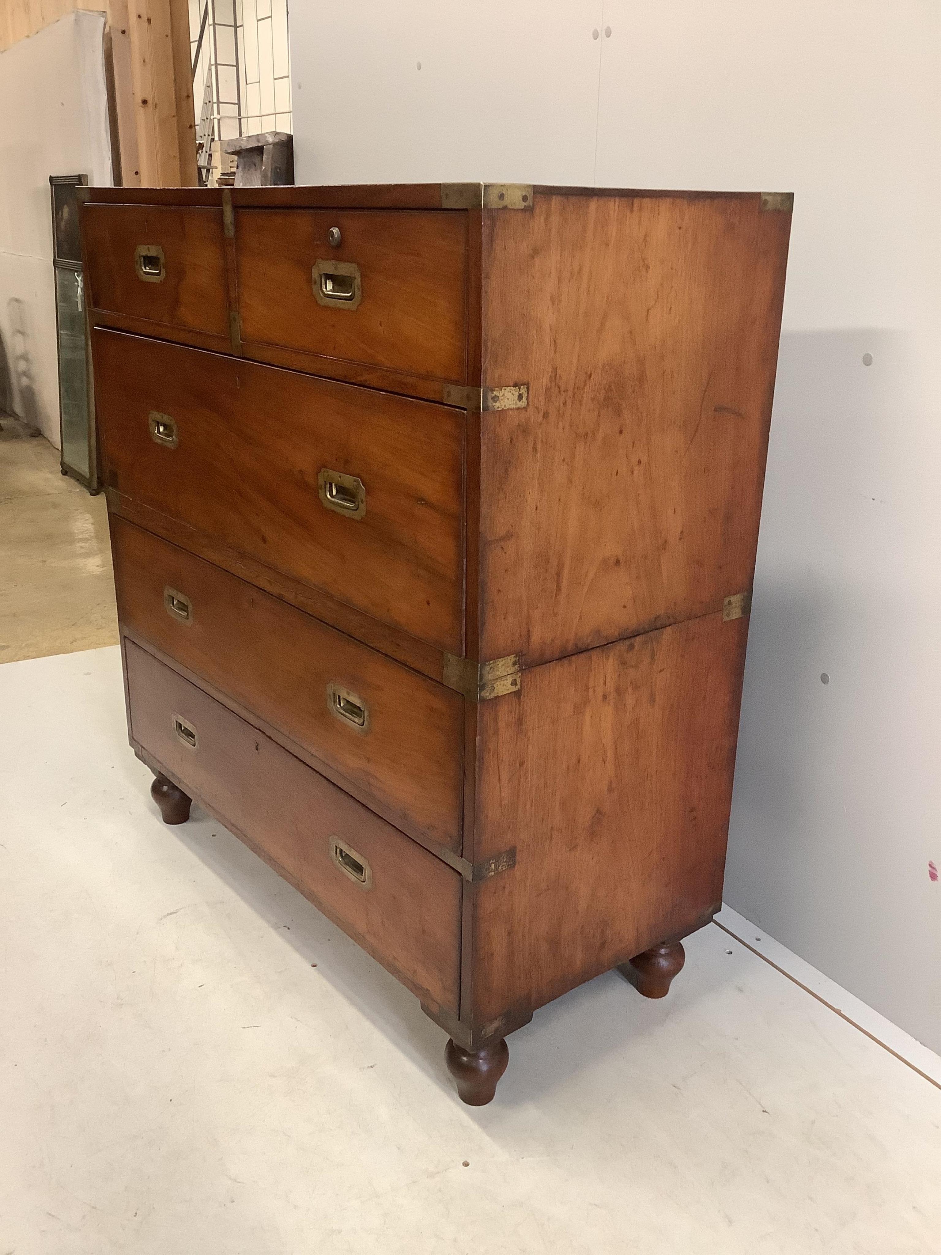 A late 19th century brass mounted mahogany two part military chest, width 99cm, depth 45cm, height 109cm. Condition - fair to good